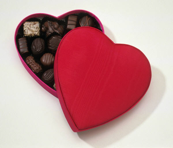 picture of dark chocolates in a red heart container